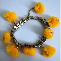 Pulsera pompom